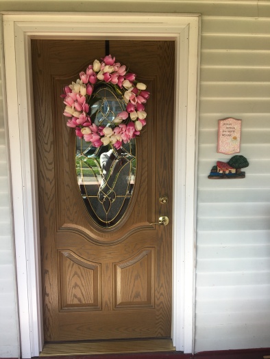 Front door with spring wreath